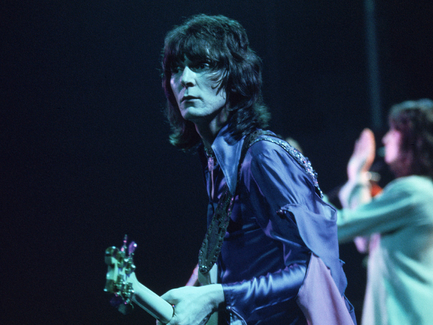 ca. 1970s, USA --- Chris Squire Playing the Bass --- Image by © Neal Preston/CORBIS